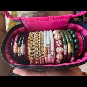 NEW BuDhaGirl set of 12 bracelets. Size L. Brand new with carrying case.